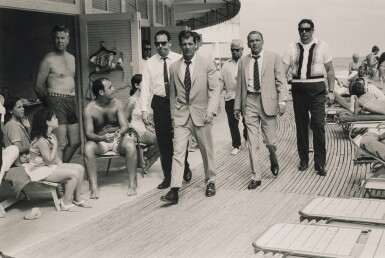 View full screen - View 1 of Lot 99. TERRY O'NEILL | FRANK SINATRA WALKING ON THE BOARDWALK, MIAMI, 1968.