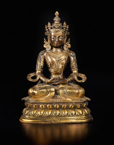 View full screen - View 1 of Lot 228. A gilt-bronze figure of Amitayus, Qing dynasty, 18th century | 清十八世紀 銅鎏金無量壽佛坐像.