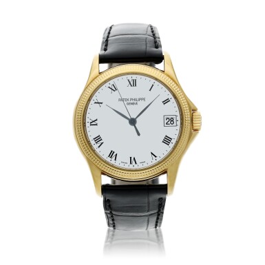 View full screen - View 1 of Lot 351. Reference 5117 A yellow gold automatic wristwatch with date, Circa 2003 .