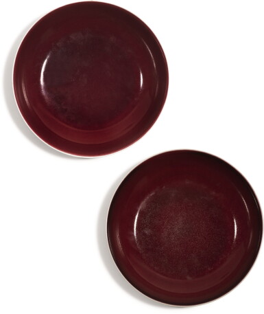 View full screen - View 1 of Lot 169. A PAIR OF COPPER-RED GLAZED DISHES QIANLONG SEAL MARKS AND PERIOD | 清乾隆 霽紅釉盤一對 《大清乾隆年製》款.