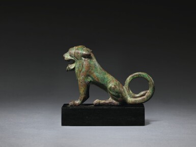 View full screen - View 1 of Lot 18. AN ETRUSCAN BRONZE FIGURE OF A LION, 2ND HALF OF THE 6TH CENTURY B.C..