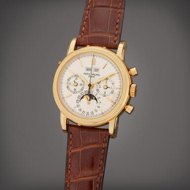 View full screen - View 1 of Lot 35. Reference 3970/E | A yellow gold perpetual calendar chronograph wristwatch with moon phases, Circa 1991.