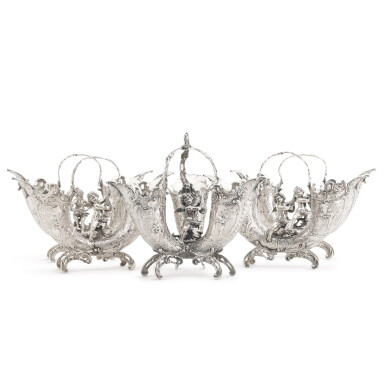 View full screen - View 1 of Lot 33. A suite of German silver vases, Neresheimer & Co., Hanau, early 20th century, one with import marks for Chester 1907.