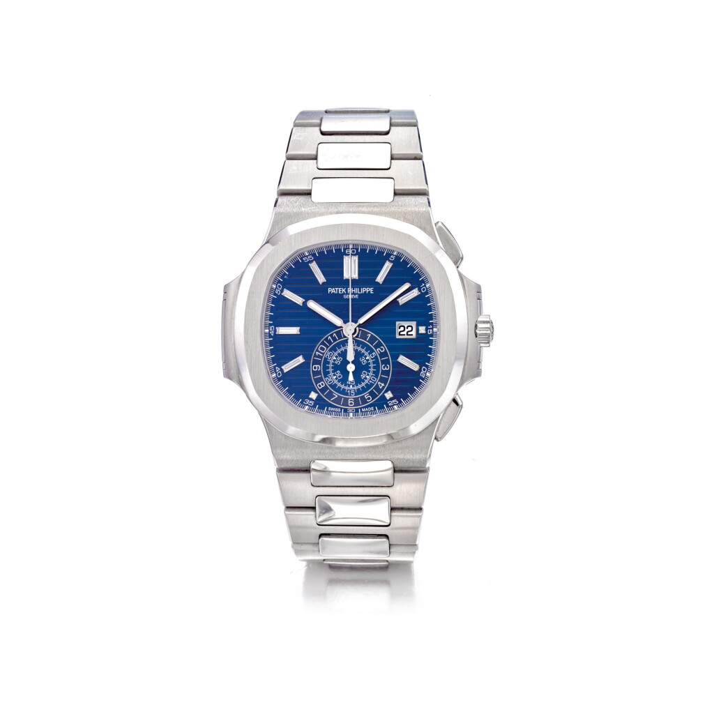 View full screen - View 1 of Lot 970. PATEK PHILIPPE | REF 5976/1G NAUTILUS 40TH ANNIVERSARY A LIMITED EDITION WHITE GOLD AUTOMATIC FLYBACK CHRONOGRAPH WRISTWATCH WITH DATE AND BRACELET MADE TO COMMEMORATE THE 40TH ANNIVERSARY OF THE NAUTILUS CIRCA 2016 | |5976/1G型號「NAUTILUS 40TH ANNIVERSARY」限量版白金自動上鏈飛返計時鍊帶腕錶備日期顯示,為紀念NAUTILUS面世40週年製造,年份約2016百達翡麗.