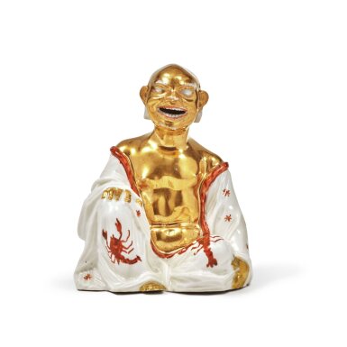 View full screen - View 1 of Lot 35. A Rare Early Meissen Iron-Red and Gilt Porcelain Figure of a Seated Pagod, Circa 1715.