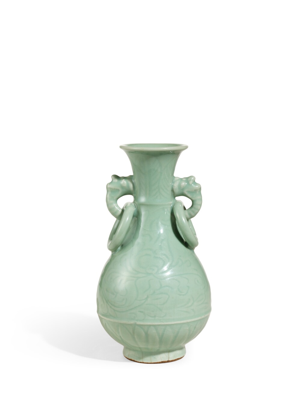 View full screen - View 1 of Lot 2018. An heirloom Longquan celadon 'peony' handled vase, Ming dynasty | 明 龍泉青釉刻牡丹紋獸耳銜環瓶.