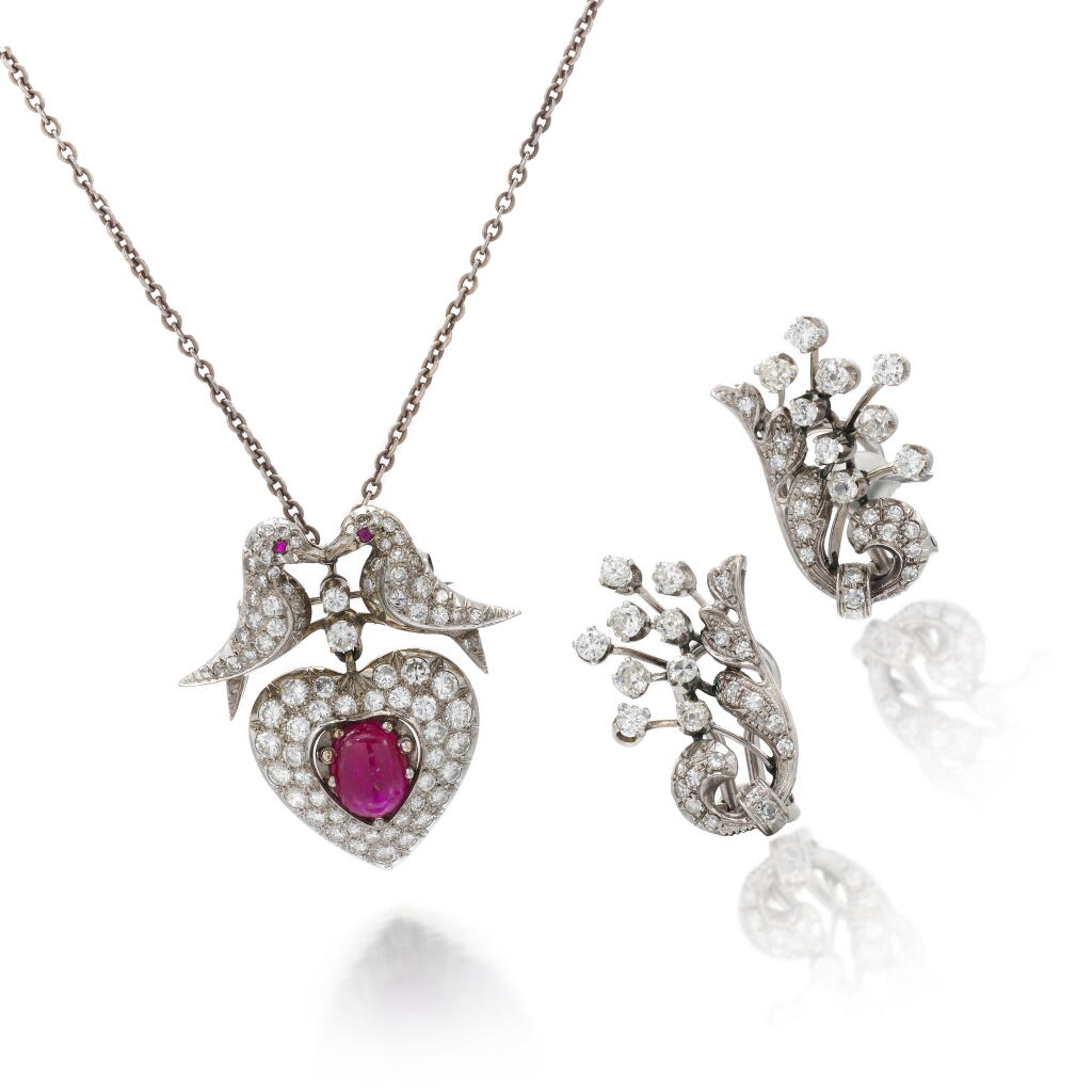 View full screen - View 1 of Lot 52. Ruby and diamond necklace and a pair of diamond ear clips | Paio di orecchini in diamanti e collana in rubino e diamanti .