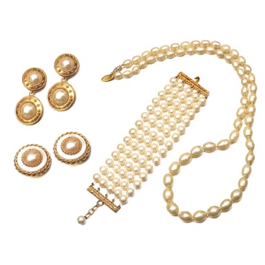 View full screen - View 1 of Lot 1327. Lot of Two Pairs of Golden Metal and Imitation Pearl Clip Earrings, One Imitation Pearl Bracelet and One Imitation Pearl Necklace.