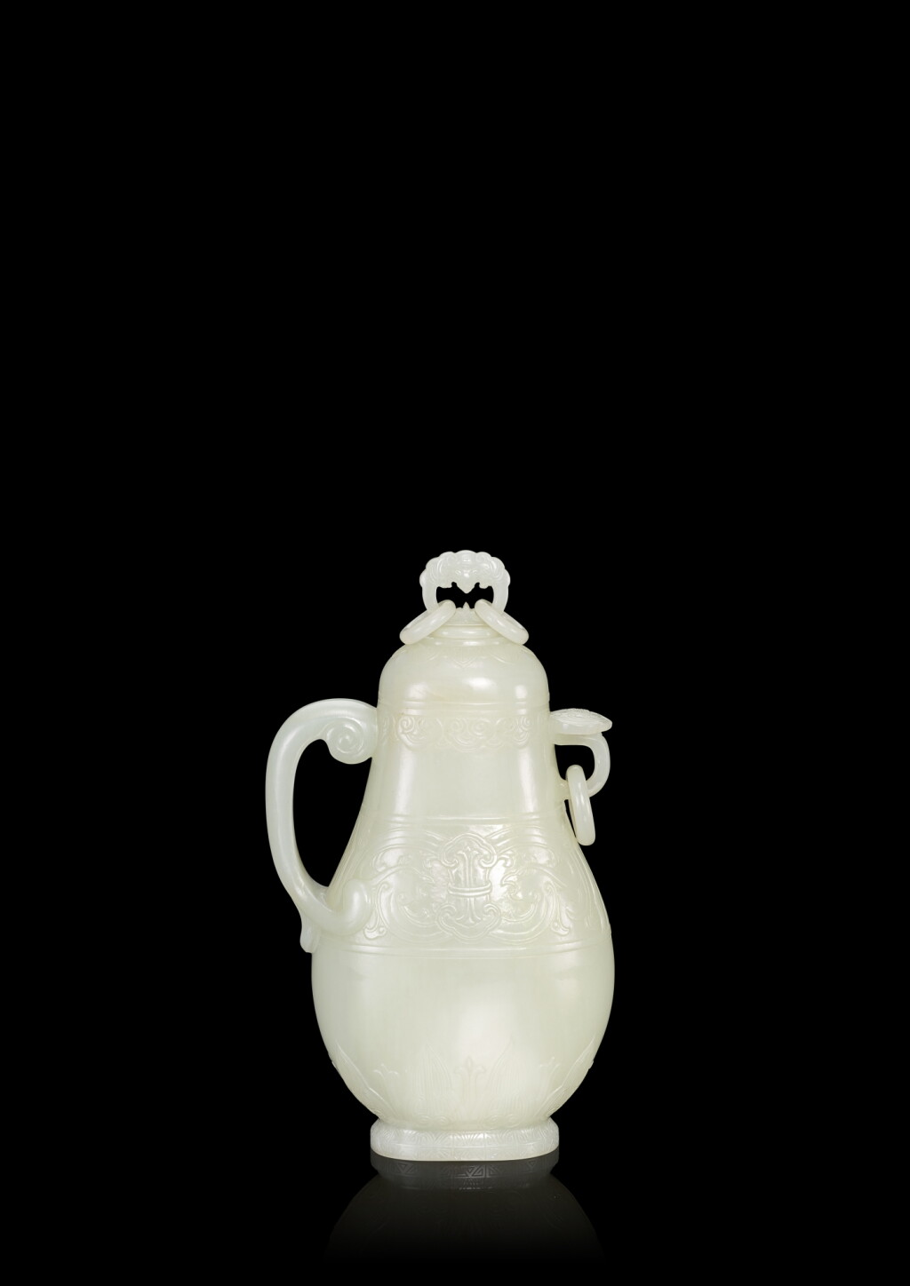 View full screen - View 1 of Lot 3680. A white jade archaistic ‘kui-phoenix’ pouring vessel and cover, Qing dynasty, Qianlong period | 清乾隆 白玉鳳紋仿古三環蓋壺.