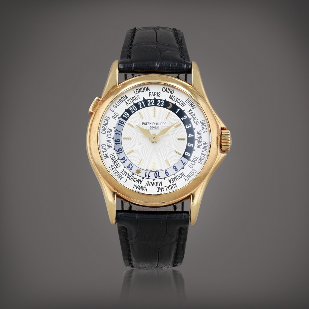 View full screen - View 1 of Lot 359. Reference 5110J Montre bracelet à heure universelle en or jaune | Yellow gold world time wristwatch Vers 2002 | Circa 2002.