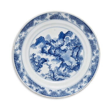 View full screen - View 1 of Lot 315. A blue and white 'Master of the Rocks' dish, Qing dynasty, Kangxi period | 清康熙 青花山水圖盤.