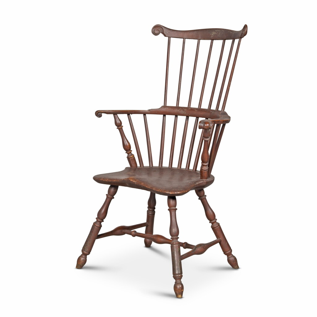 View full screen - View 1 of Lot 171. Important and Exceptional Redddish Brown-Painted Scroll-Carved Comb-Back Knuckled Windsor Armchair, Philadelphia, Pennsylvania, Circa 1775.