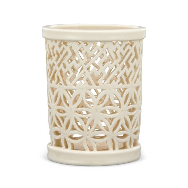 View full screen - View 1 of Lot 310. A Dehua reticulated brushpot 17th century | 十七世紀 德化白瓷鏤雕錦紋筆筒 「梅則」字.