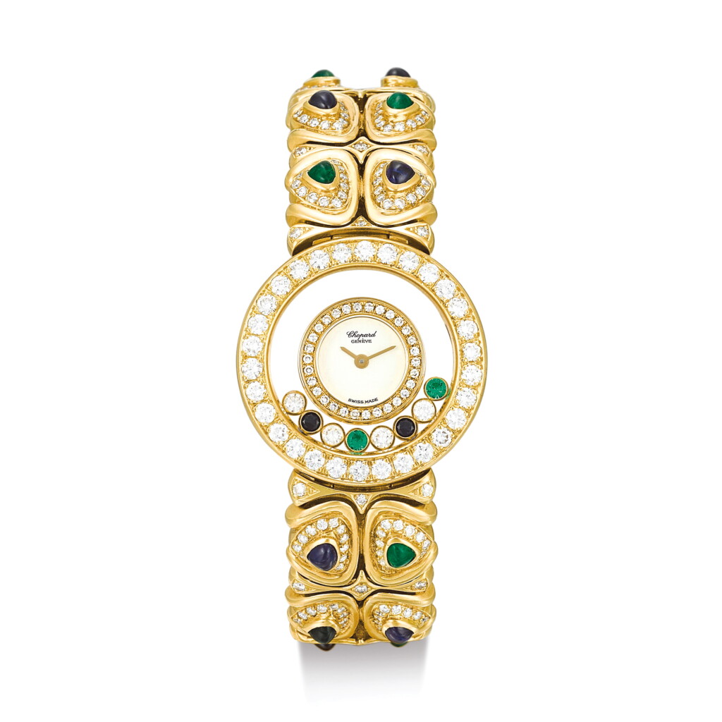 View full screen - View 1 of Lot 2142. CHOPARD | HAPPY DIAMONDS, REFERENCE 20/5572 A YELLOW GOLD, DIAMOND, EMERALD AND SAPPHIRE-SET BRACELET WATCH, CIRCA 2000" | 蕭邦 | Happy Diamonds 型號20/5572 黃金鑲鑽石、綠寶石及藍寶石鏈帶腕錶,錶殼編號319789及4117,約2000年製".