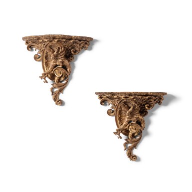 View full screen - View 1 of Lot 15. A pair of Louis XV style carved giltwood and stucco consoles d'applique, late 19th century.