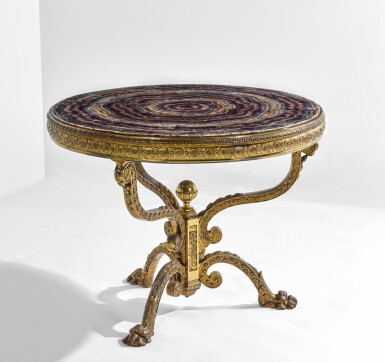 View full screen - View 1 of Lot 23. A Victorian gilt-brass mounted Blue John centre table, circa 1860, the top attributed to Thomas Woodruff, the base by William Tonks and Sons.