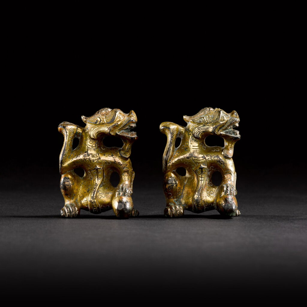 View full screen - View 1 of Lot 116. Two gilt-bronze 'dragon' supports, Eastern Han or later | 東漢或以後 鎏金銅坐龍承足兩件.