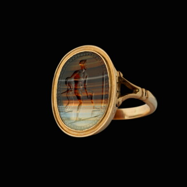 View full screen - View 1 of Lot 261. Intaglio with a standing hero.
