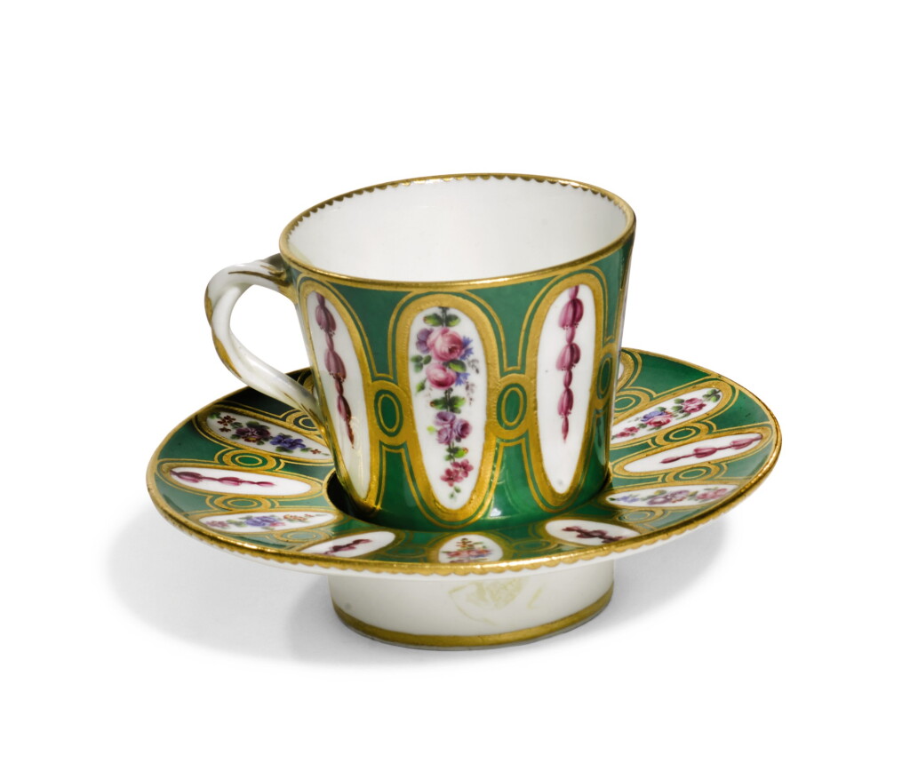View full screen - View 1 of Lot 96. A SEVRES PORCELAIN GREEN-GROUND CUP AND SOCKETED SAUCER, 1768.