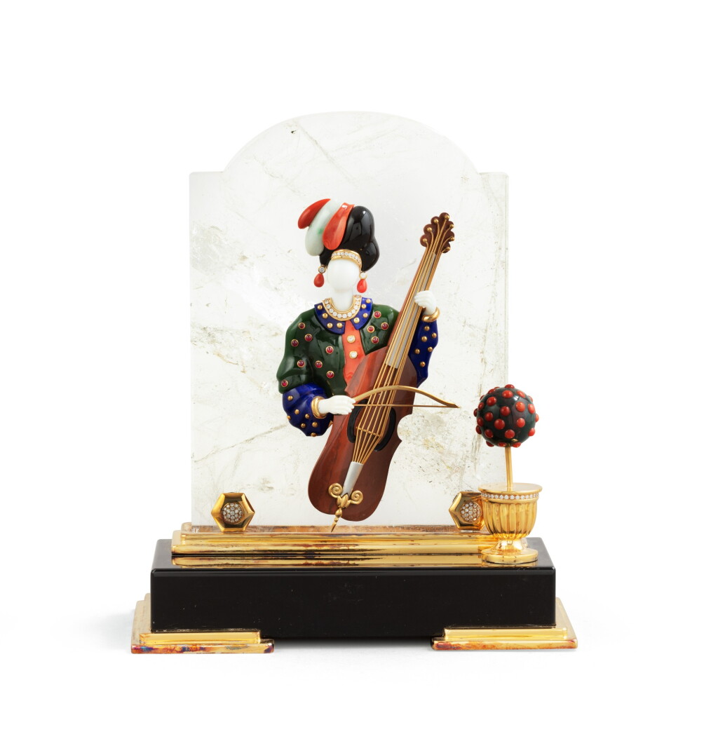 View full screen - View 1 of Lot 28. A French silver-gilt, obsidian, coral, jade and rock-crystal sculpture of a musician, Mellerio, Paris, 2002 | Sculpture représentant une musicienne en vermeil, corail, jade, lapis, cristal de roche, obsidienne et pierres dures par Mellerio, Paris, 2002.