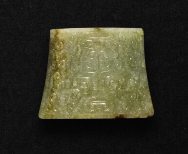 View full screen - View 1 of Lot 234. A CELADON JADE 'TAOTIE' SCABBARD CHAPE LATE EASTERN ZHOU DYNASTY - WESTERN HAN DYNASTY | 東周晚期至西漢 青玉饕餮紋劍珌.
