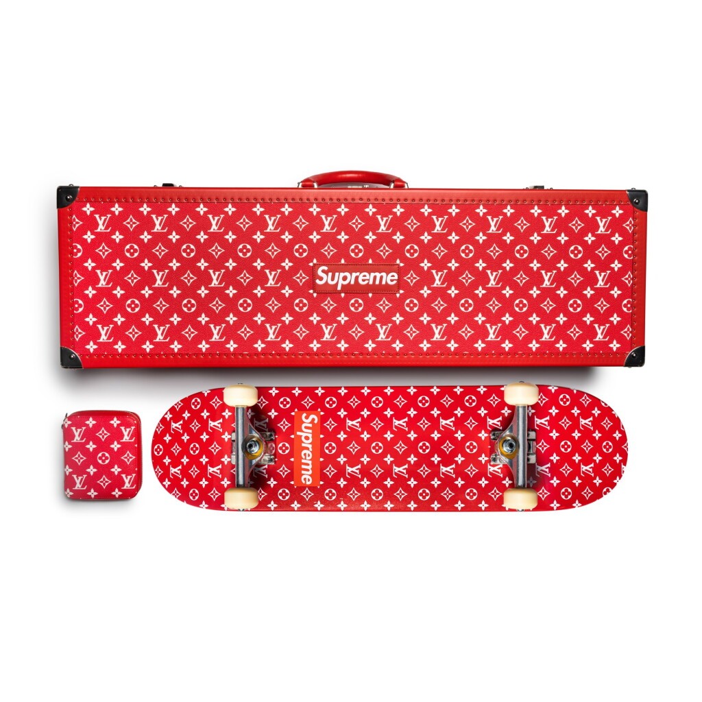 View full screen - View 1 of Lot 29. Louis Vuitton X Supreme | Red and White Monogram Coated Canvas Boîte Skateboard Trunk, With Deck And Trucks.
