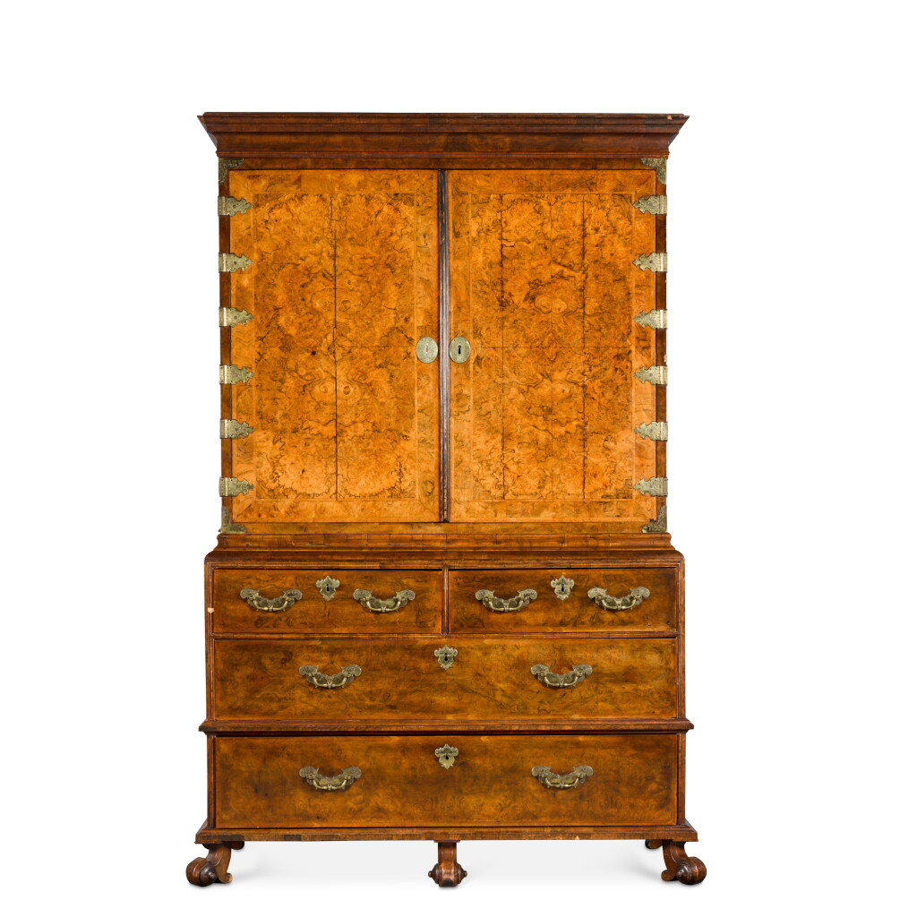 View full screen - View 1 of Lot 117. A George I walnut and burr-walnut cabinet on chest, circa 1715, in the manner of Coxed and Woster.