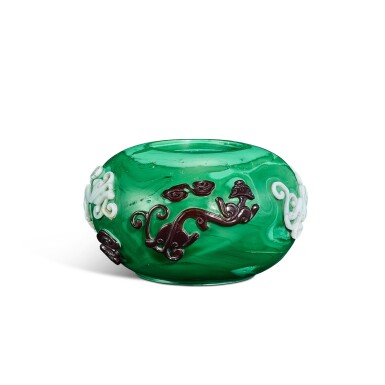 View full screen - View 1 of Lot 951. A red and white overlay green glass 'chilong' waterpot, Mark and period of Qianlong | 清乾隆 綠地套紅白料螭龍紋水丞 《乾隆年製》款.