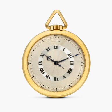 View full screen - View 1 of Lot 2483. New York retailed | A very fine and slim yellow gold openface dress watch with two-tone engine-turned dial, Circa 1927.