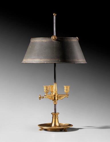 View full screen - View 1 of Lot 62. A gilt-bronze lampe bouillotte, Empire, from the château de Meudon | Lampe bouillotte en bronze d'époque Empire provenant du château de Meudon.