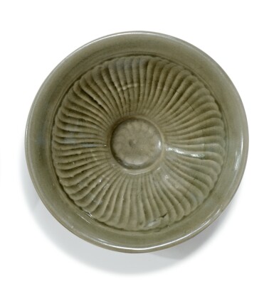 View full screen - View 1 of Lot 538. A molded 'Yaozhou' celadon-glazed 'chrysanthemum' conical bowl, Northern Song / Jin dynasty.