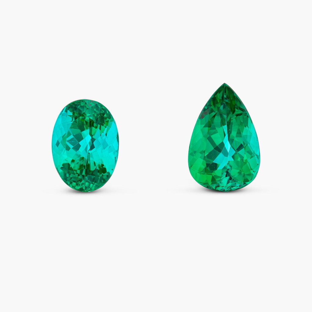 View full screen - View 1 of Lot 24. Two Unmounted Paraíba Tourmalines "6.65 及 6.44克拉「巴西」帕拉伊巴碧璽 兩枚 ".