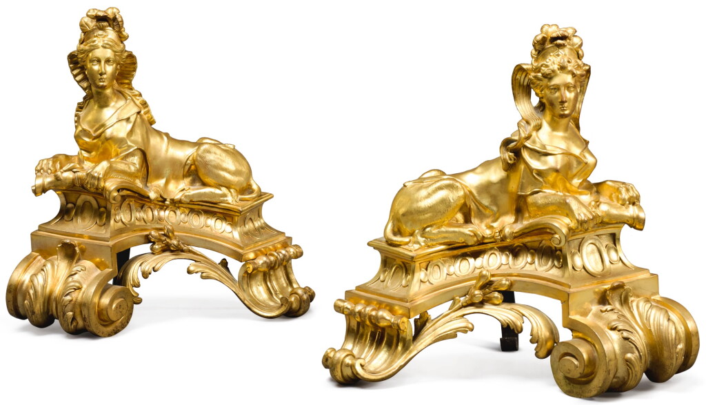 View full screen - View 1 of Lot 151. A PAIR OF RÉGENCE STYLE GILT-BRONZE CHENETS CIRCA 1860.