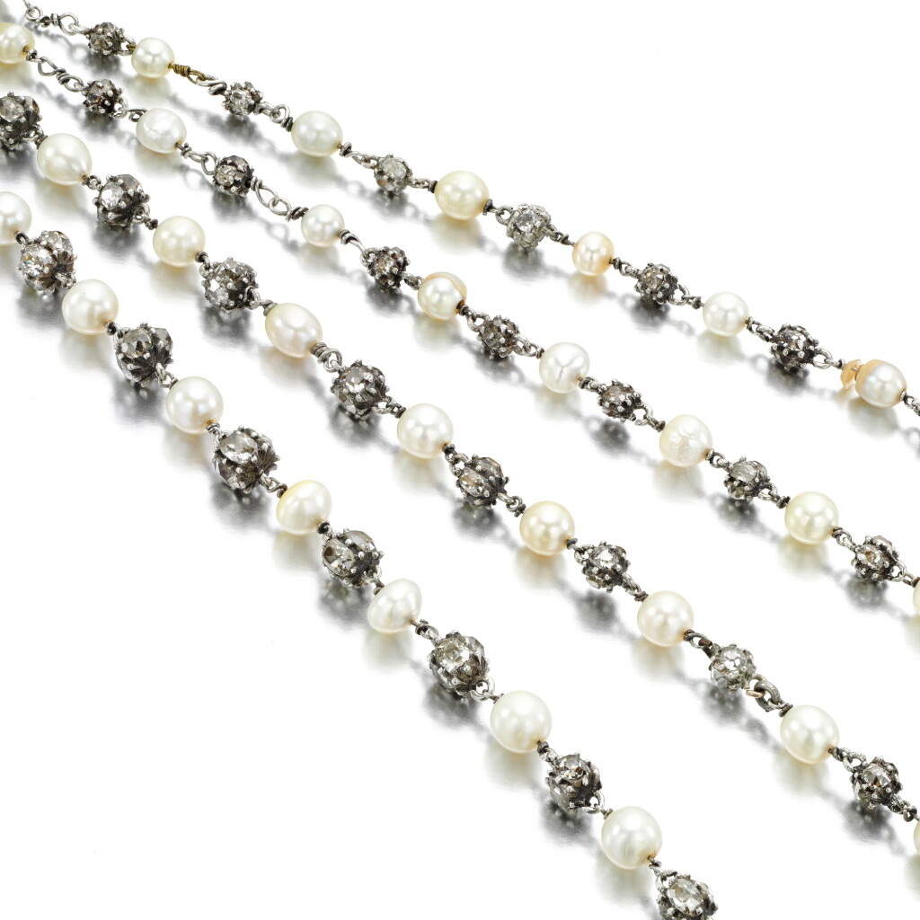 View full screen - View 1 of Lot 32. Natural pearl and diamond long chain, circa 1900.