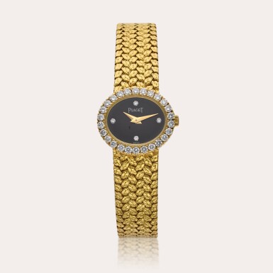 View full screen - View 1 of Lot 516. Reference 8306 D 2 | A yellow gold and diamond-set bracelet watch with onyx dial, Circa 1980.
