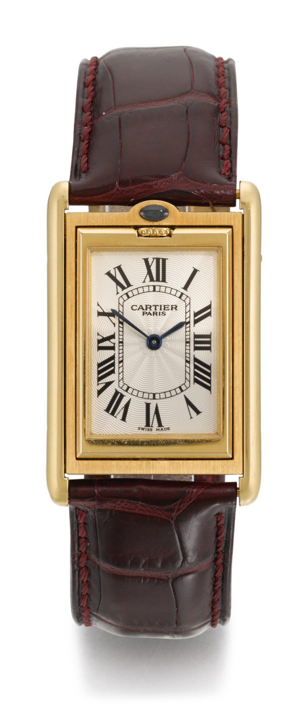 View full screen - View 1 of Lot 56. CARTIER | TANK BASCULANTE, REFERENCE 2499MC, YELLOW GOLD REVERSIBLE WRISTWATCH, CIRCA 2001.
