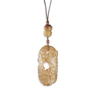 View full screen - View 1 of Lot 830. A celadon and russet jade 'chilong' pendant, Han - Song dynasty | 漢至宋 青玉螭龍紋珮.