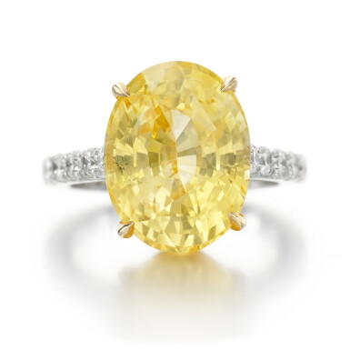 View full screen - View 1 of Lot 16. YELLOW SAPPHIRE AND DIAMOND RING.