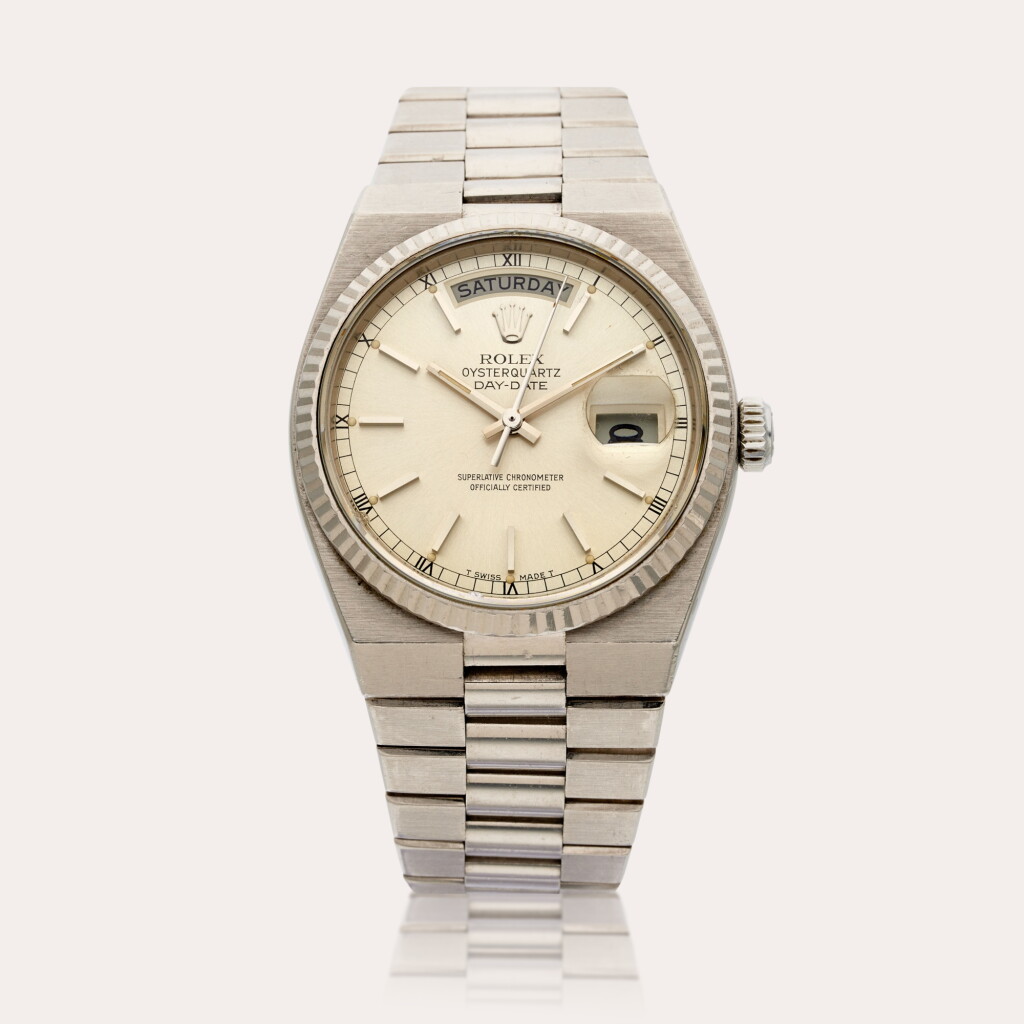 View full screen - View 1 of Lot 313. Reference 19019 Oysterquartz Day-Date | A white gold bracelet watch with day and date, Circa 1979.