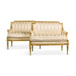 A pair of Louis XVI style carved giltwood canapés, late 19th century
