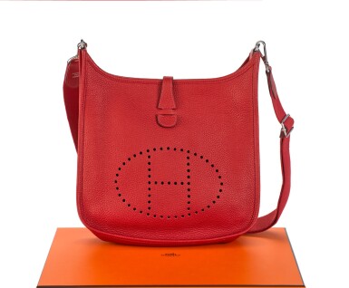 View full screen - View 1 of Lot 12. EVELYNE III 29 ROUGE CASAQUE COLOUR IN CLEMENCE LEATHER WITH PALLADIUM HARDWARE. HERMÈS, 2013.