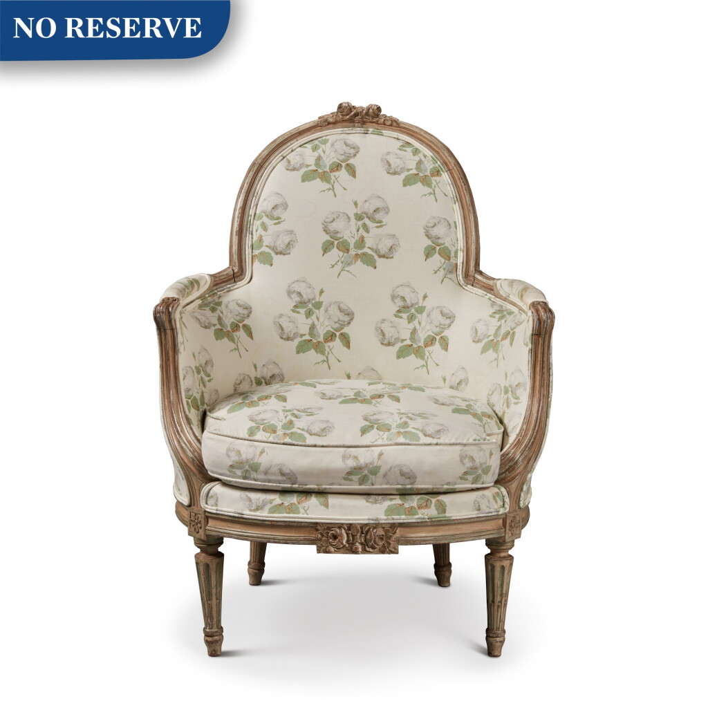 View full screen - View 1 of Lot 375. A Louis XVI Style White and Green Painted Bergère, Late 19th/Early 20th Century.