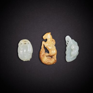 View full screen - View 1 of Lot 6956. Two white jade pendants, Qing dynasty, 18th - 19th century, and a pale celadon jade winged horse | 清十八至十九世紀 白玉瓜瓞綿綿墜飾、瑞獸墜飾 及青白玉天馬一件.