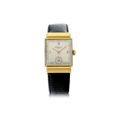 View full screen - View 1 of Lot 801. A YELLOW GOLD RECTANGULAR WRISTWATCH, CIRCA 1950.