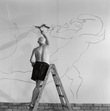 View full screen - View 1 of Lot 80. EDWARD QUINN | 'PABLO PICASSO WORKING ON THE "WAR AND PEACE STUDY" DRAWINGS ON THE WALL OF CHAPELLE DE LA PAIX (OR TEMPLE DE LA PAIX) FOR THE DOCUMENTARY FILM OF LUCIANO EMMER, VALLAURIS', 1953.