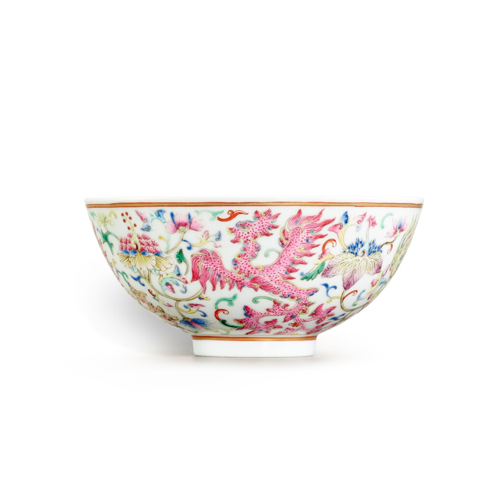 View full screen - View 1 of Lot 929. A famille-rose 'kuifeng' bowl, Mark and period of Guangxu | 清光緒 粉彩夔鳳花卉紋盌 《大清光緒年製》款.