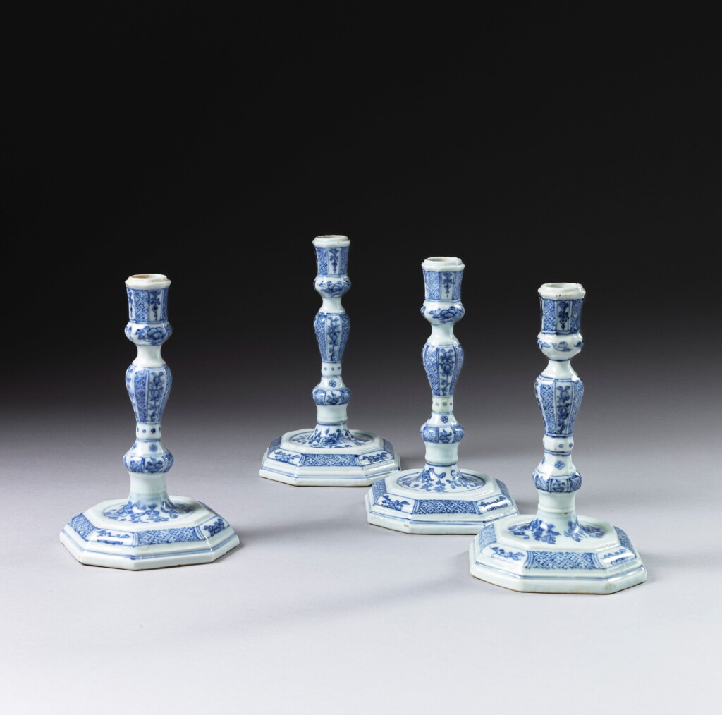 View full screen - View 1 of Lot 65. A set of four Chinese export blue and white candlesticks, Qing dynasty, 18th century.