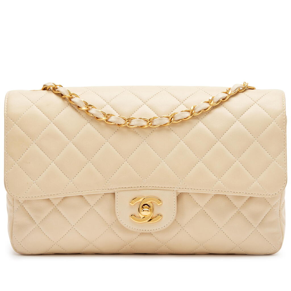 View full screen - View 1 of Lot 216. Vintage Beige Quilted Lambskin Classic Medium Flap Gold Hardware, 1996.