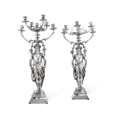 View full screen - View 1 of Lot 161. A pair of French silver-plated "laughing Bacchus" candlesticks, maker's mark of Christofle, Paris, 1878-1879 | Paire de grands candélabres à sept lumières "Bachus rieur" en métal argenté par Christofle, Paris, 1878-1879.