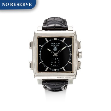 View full screen - View 1 of Lot 605. TAG HEUER | MONACO SIXTY-NINE, REFERENCE CW9111, A LIMITED EDITION STAINLESS STEEL REVERSIBLE WRISTWATCH WITH DIGITAL DISPLAY, MADE IN COLLABORATION WITH BOLLYWOOD FILM ACTOR SHAH RUKH KHAN, CIRCA 2005.